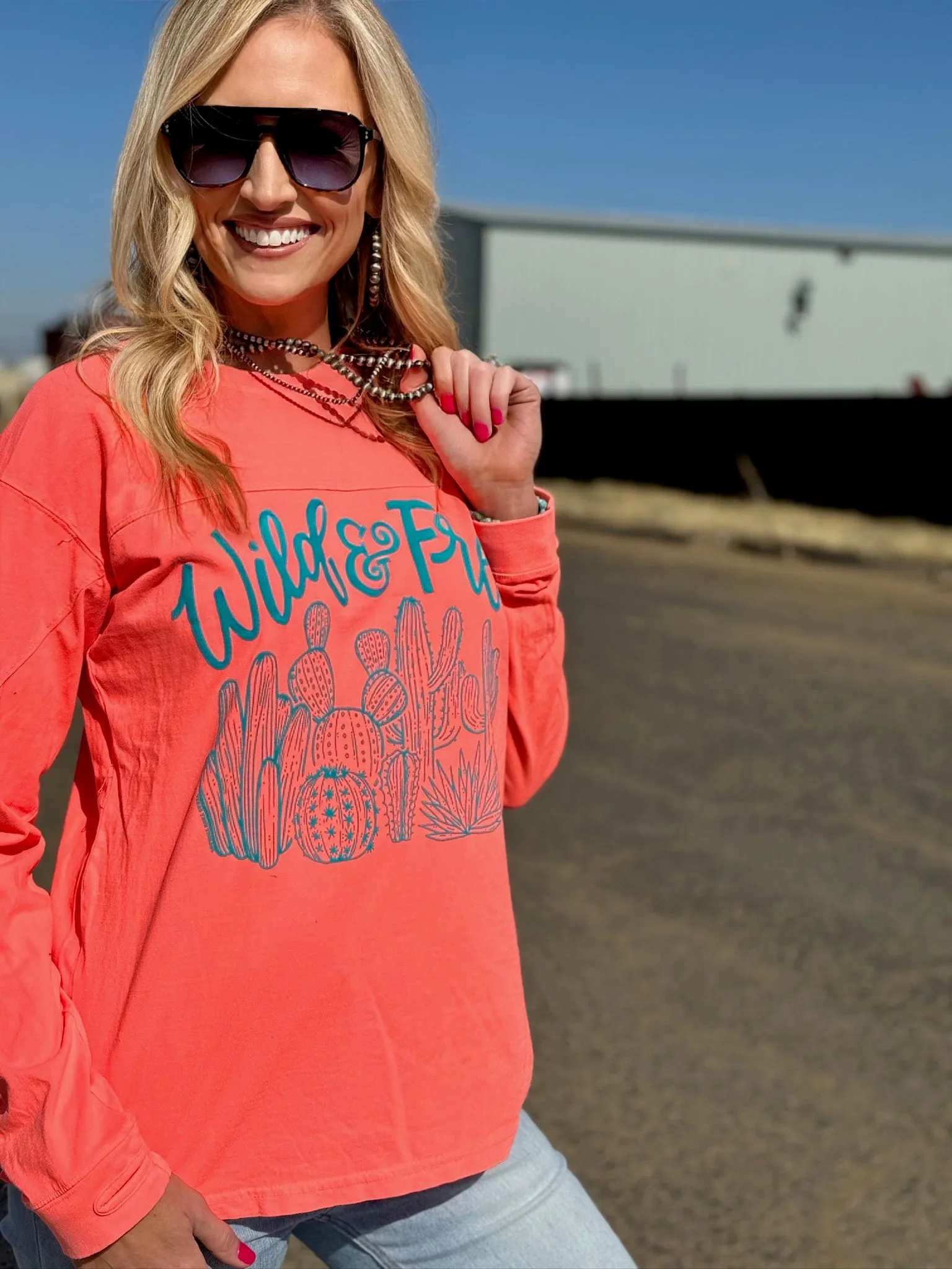 Wild & Free Turquoise Puff Ink on Coral Long Sleeve