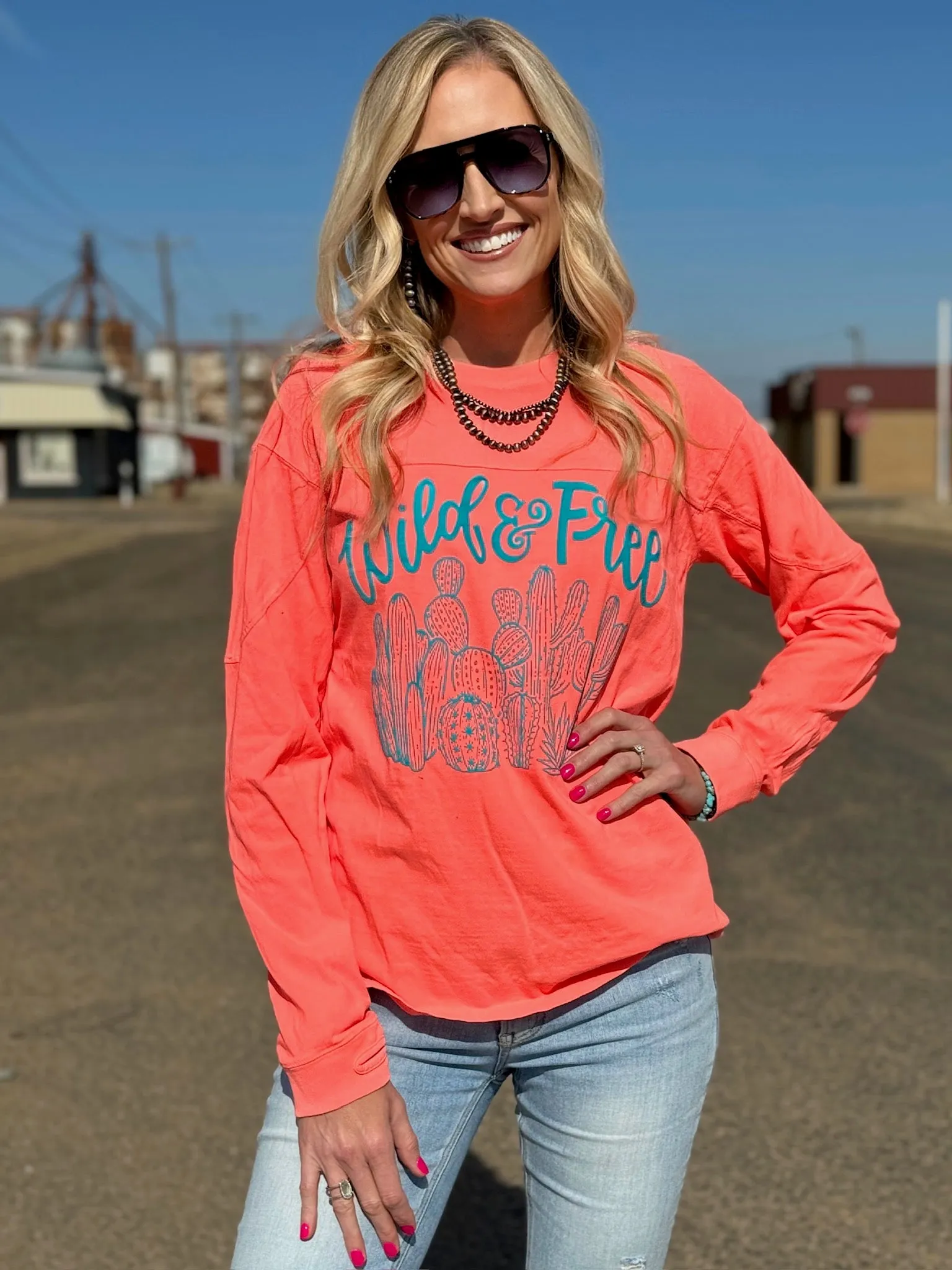 Wild & Free Turquoise Puff Ink on Coral Long Sleeve